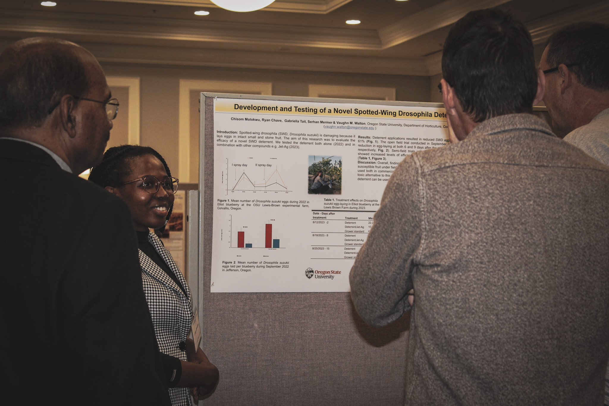 Researcher presenting a poster at the NCSFR annual conference