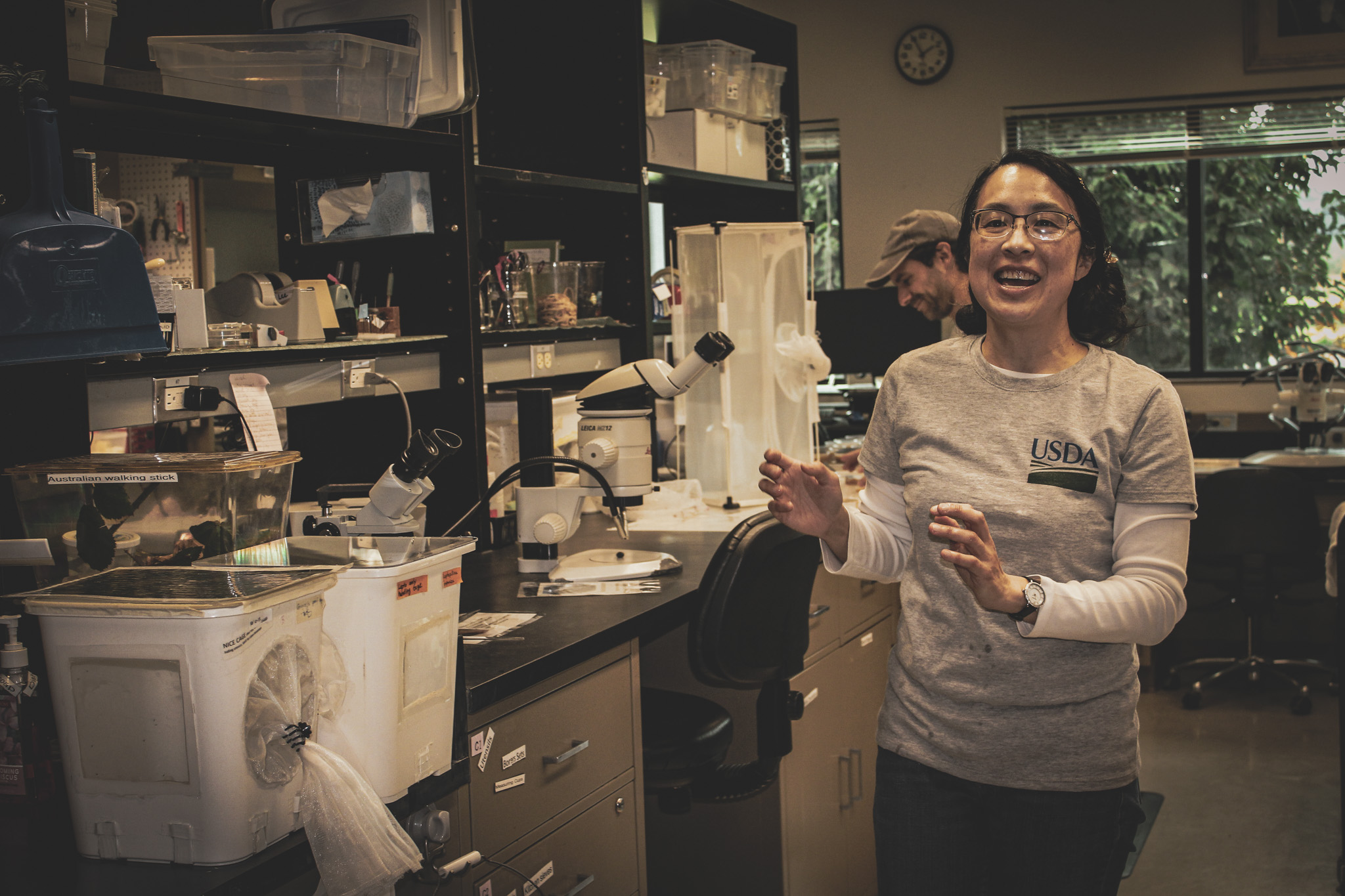 USDA researcher explaining findings in the laboratory